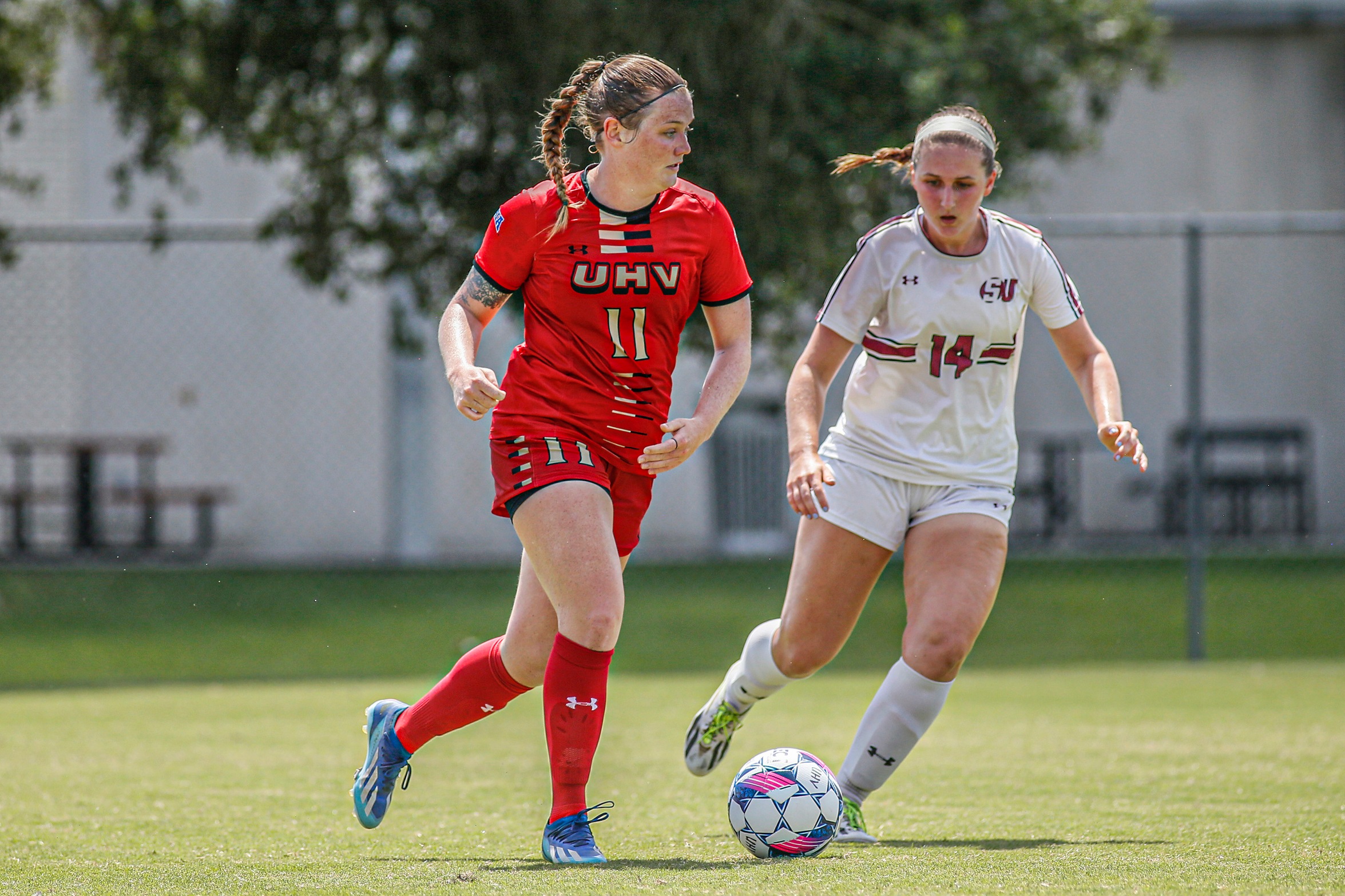 UHV's Estelle Flanagan tries to evade a defender during a non-conference game against Schreiner University at The Cage on Friday, Sept. 13, 2024. (Lily Standridge/UHV Athletics)